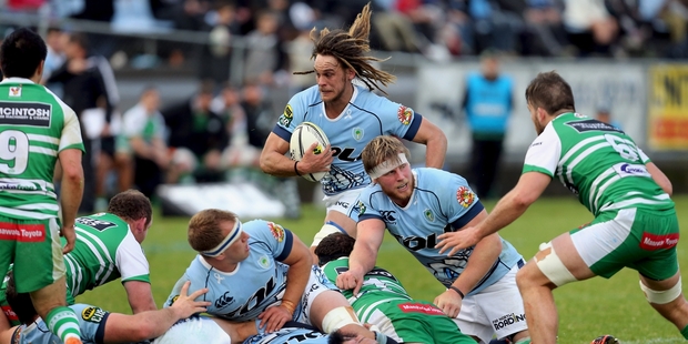 Northland's Dan Pryor (left) and Jack Ram (above) getting through a heavy workload at Toll Stadium yesterday during their 28-23 loss to Manawatu. PHOTOS/JOHN STONE