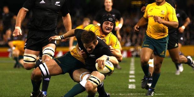 Richie McCaw scores one of the 10 tries during the 2010 Bledisloe Cup encounter. Photo / Getty Images