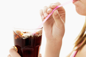 Slurping sugar filled soft drinks is not helping with the battle of the bulge.
Photo / Thinkstock