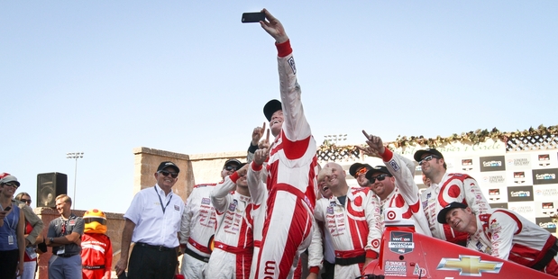 Scott Dixon takes a selfie after winning at Sonoma last week. Photo / AP