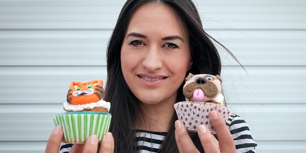 Joena Joyce with some of her 'animal cruelty-free' vegan cupcakes being sold at the Tauranga SPCA Animal shelter on Saturday. Photo / Andrew Warner