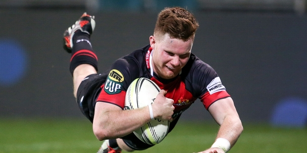 Mitchell Drummond scores one of Canterbury's six tries against Northland last night. Photo / Getty Images
