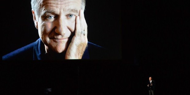 Actor Billy Crystal (right) speaks in tribute to the late Robin Williams onstage at the 66th Annual Primetime Emmy Awards. Photo / AFP