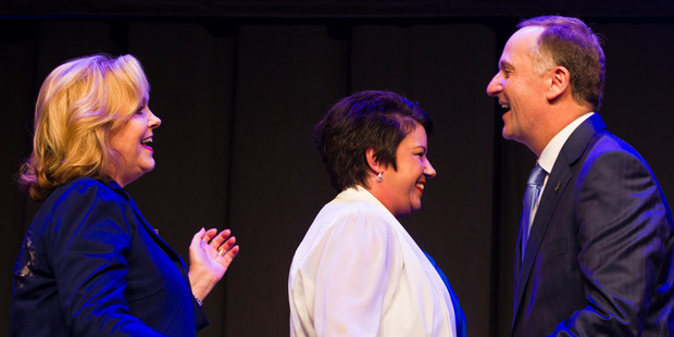 Judith Collins and Paula Bennett congratulate the Prime Minister John Key after his speech at the National Party election campaign launch earlier this month.