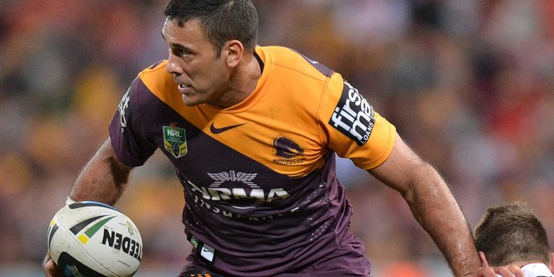 Justin Hodges of the Broncos pushes away from the defence during the NRL match between the Brisbane Broncos and the St George Illawarra Dragons in Brisbane. Photo / Getty Images