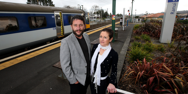 Elaine Ben and Derek Judge outside the Ranui Train Station. Photo / Jason Oxenham.