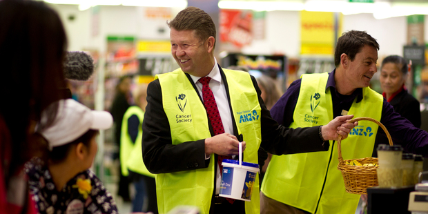 David Cunliffe collects for the Cancer Society during a walkabout at Lynn Mall. Photo / Dean Purcell