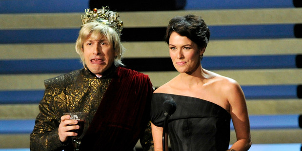 Andy Samberg and Lena Headey present the award for outstanding miniseries on stage at the 66th Annual Primetime Emmy Awards. Photo / AP