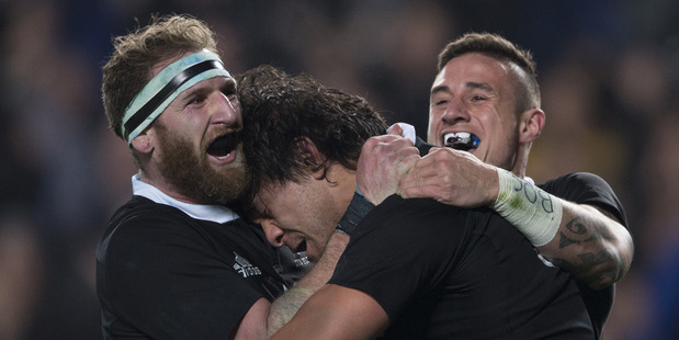 All Blacks forward Steven Luatua celebrates with Kieran Read and TJ Perenara after scoring the final try against the Wallabies. Photo / Brett Phibbs
