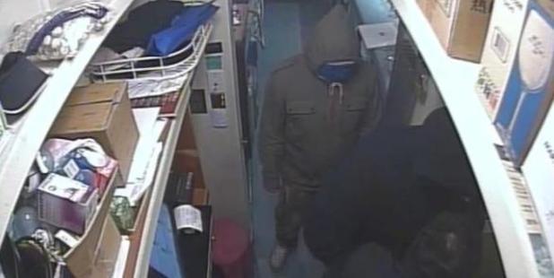 Police released this still from CCTV footage showing two men robbing Fat Boys Tavern in Albany.