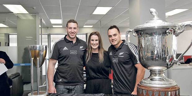 STAR VISIT: All Blacks Luke Romano and Israel Dagg with Hawke's Bay Today advertising manager Catrina O'Connell. Photo/Paul Taylor