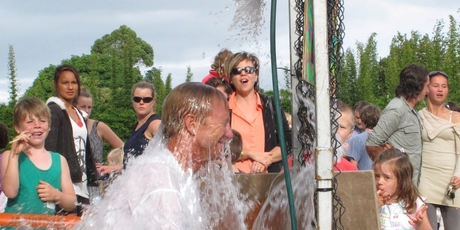 Extreme fisherman Matt Watson gets a dunking at last year's Riverview School bazaar. PHOTO/PETER DE GRAAF
