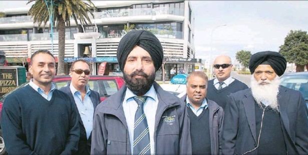 CONCERNED: Cabbies from Tauranga Mount Taxis gathered at Brendan Horan's office yesterday to voice concerns about abuse and people not paying fares.