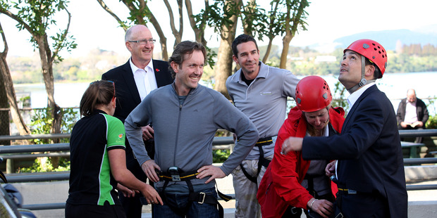 The Bay of Plenty Times general manager David Mackenzie gets a few hints from MP Simon Bridges before he takes part in Drop your Boss Tauranga for Foundation for Youth Development. Photo/RUTH KEBER