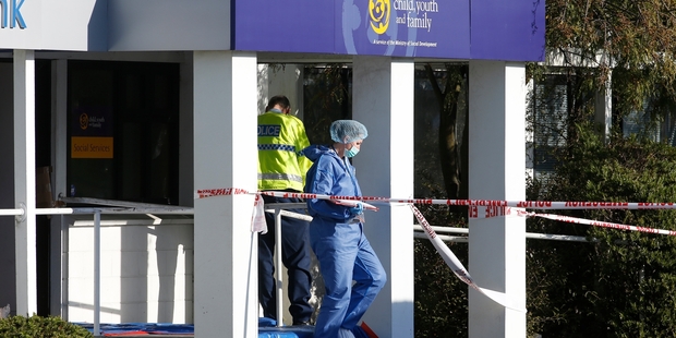 Police and forensics officers at the Ashburton Winz office on Monday where Russell Tully allegedly killed two women and injured another. Photo / Ashburton Guardian