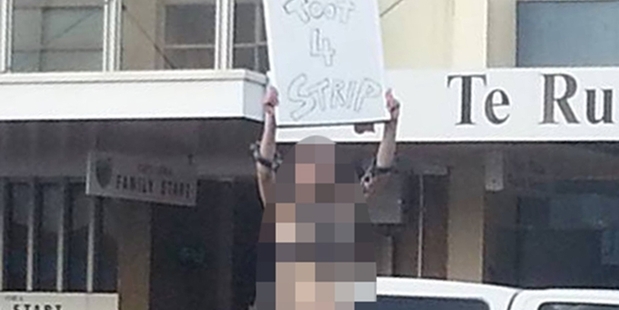 A St Cuthbert's School student on the street in her underwear. Photo / Supplied