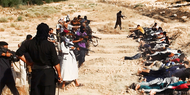 Film image posted on a militant website which has been verified appears to show IS militants taking aim at captured Iraqi soldiers after capturing a Tikrit base. Photo / AP