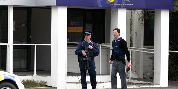 Police at the scene of the double shooting in Ashburton. Photo / Martin Hunter