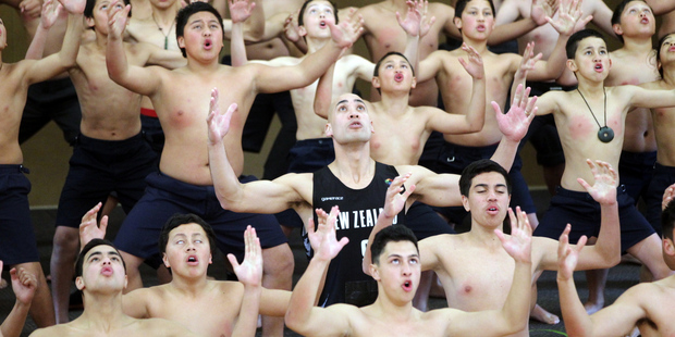 Paora Winitana led 50 intermediate and high school students at the Hastings Intermediate School grounds at 1pm in a rendition of the haka which Maori TV filmed. Photo / Paul Taylor