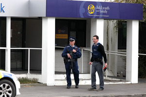 Police at the scene of the double shooting in Ashburton. Photo / Martin Hunter