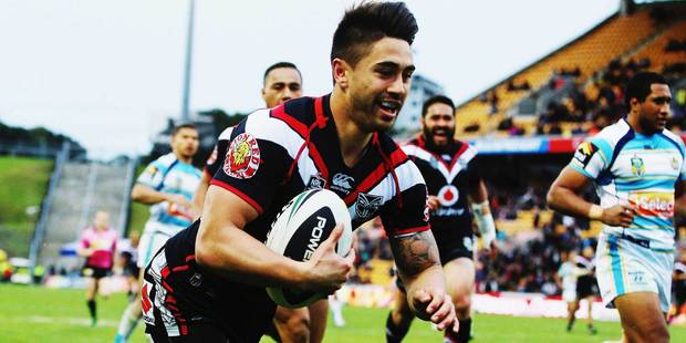 Shaun Johnson scores a try in the Warriors 42-0 over the Gold Coast Titans at Mt Smart Stadium. Photo / Getty Images