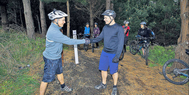 Hawke's Bay Mountain Bike Club chairman Scott Richardson (left) and Spark Business HB manager Simon Fletcher shake on a sponsorship deal for the developing trails. Photo / Supplied