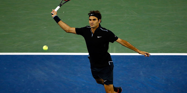 Roger Federer outlasted Gael Monfils to win a five-set thriller and advance to the US Open semifinals. Photo / Getty