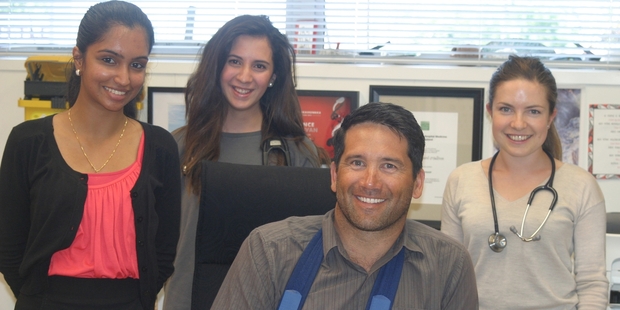 Kiwibank New Zealander of the Year Award finalist Dr Lance O'Sullivan with students whose research he is supervising (from left) Heena Khatri, Kopowairua Stephens and Sunniva Jones.