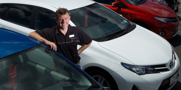 Graeme Wilson, of Toyota Rotorua, with some of the yard's Corollas - Rotorua's favourite new car for 2013. Photo/Stephen Parker