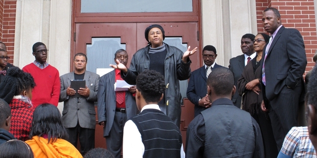 George Stinney's second cousin Irene Lawson-Hill (centre) tells a crowd her family won't stop battling for justice for George at a rally in Manning, South Carolina. Photo / AP