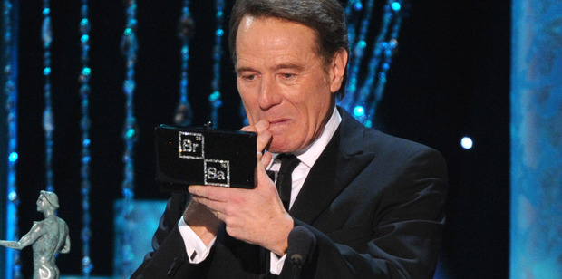 Bryan Cranston accepts the award for outstanding performance by a male actor in a drama series at the 20th annual Screen Actors Guild Awards. Photo/AP