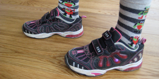 The pink shoes that Theo is now the proud owner of.