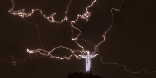 Lightning flashes over the statue of Christ the Redeemer on top of the Corcovado hill in Rio de Janeiro, Brazil Photo / AFP