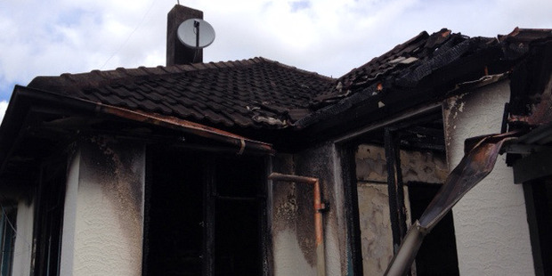 The burnt out house in Clements Street, Otahuhu. Photo / Richard Robinson