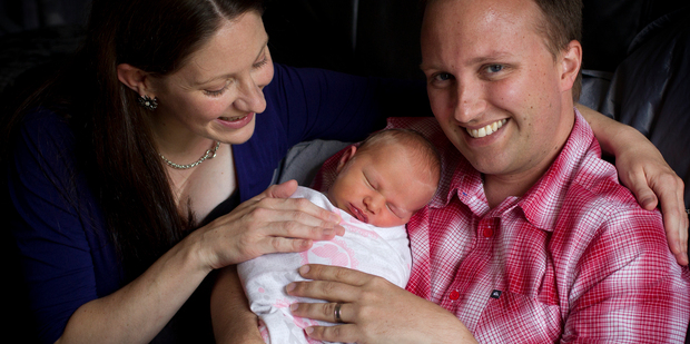 Jared Noel and wife Hannah with their daughter, Elise Alexandra Grace Noel, at home in Te Atatu. Photo / Sarah Ivey