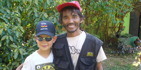 David with trekking guide Noi, a master at teaching tourists how to cook sticky rice on a campfire . Photo / Andrew Laxon