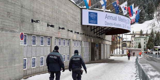 Swiss police patrol outside of the Congress Center, prior to the opening of the 44. Annual Meeting of the World Economic Forum, WEF, in Davos, Switzerland. Photo / AP