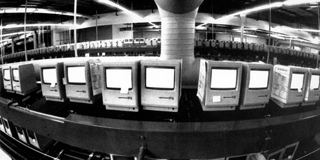 Thousands of Apple Macintosh computers sit on double decked manufacturing lines in this 1984 picture. Photo / AP