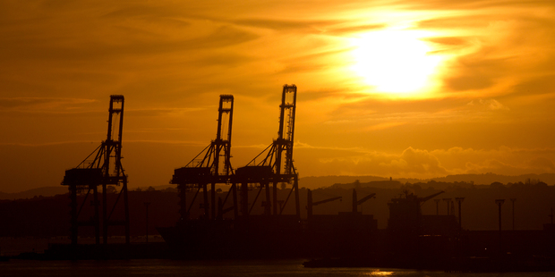 Chinese credit rating agency Dagong has downgraded its outlook for New Zealand to negative. Ports of Auckland container cranes at sunrise. Herald Photo / Brett Phibbs