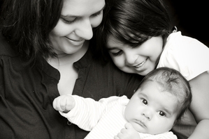 Sandy Hayer of Tummy Mummy NZ with her daughters.