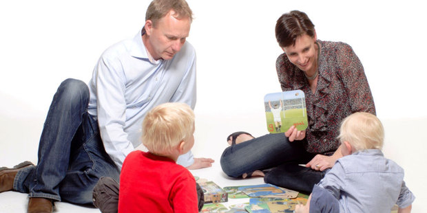 Philip and Emma Thompson of Sport in Art, with their children George and Freddie.