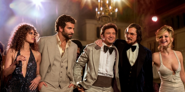 Amy Adams, Bradley Cooper, Jeremy Renner, Christian Bale and Jennifer Lawrence in American Hustle.