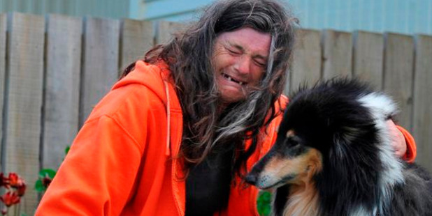 Housing NZ tenant Taina Goodwillie with her dog Bracken. Photo / Craig Baxter