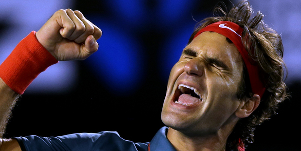 Roger Federer celebrates after defeating Andy Murray at the Australian Open. Photo / AP