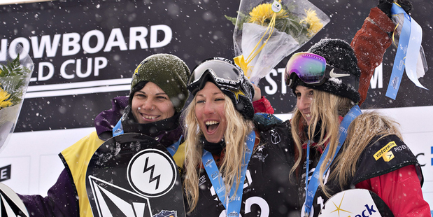 New Zealand's Christy Prior, middle, celebrates her gold medal win with silver medallist Cheryl Maas, left, of the Netherlands, and Anna Gasser, of Austria. Photo / AP