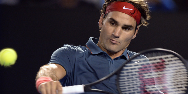 Roger Federer wound back the clock to book his 11th consecutive quarter-final appearance in Melbourne. Photo / AP