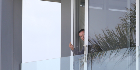 Phil Rudd, the drummer in the Australian rock band AC/DC, wasn't talking to reporters gathered outside his Tauranga house yesterday. Photo/John Borren