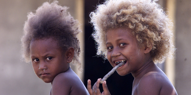 Village children in Honiara. Photo / Alan Gibson