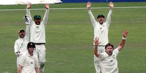 GOT 'IM: Bevan Small successfully appeals the wicket of Josh Brodie with wicketkeeper Kruger van Wyk, Kieran Noema-Barnett and Jamie How in chorus.
