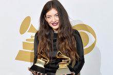 Lorde with her two Grammys. Photo / Getty Images